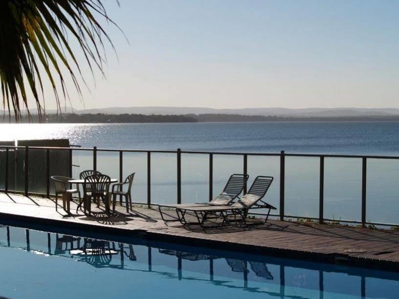 The Beachcomber Hotel & Resort, Ascend Hotel Collection Toukley Exteriér fotografie View of the bay from a hotel