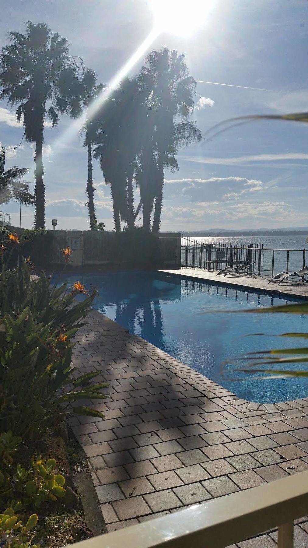 The Beachcomber Hotel & Resort, Ascend Hotel Collection Toukley Exteriér fotografie View of the pool at the hotel